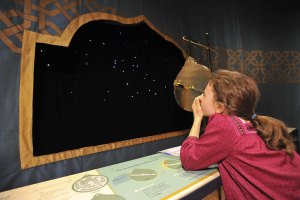 A child in an exhibition about the Silk Road, at the American Museum of Natural History.