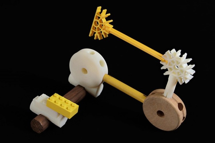 The Free Universal Construction Kit from Free Art and Technology Lab, which allow you to combine  Lego, K’Nex, Bristle Blocks, Tinkertoys, and more. 